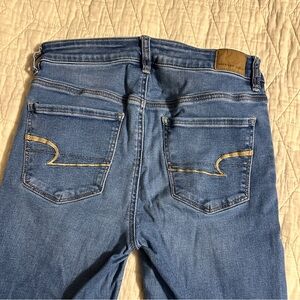 AE medium wash skinny jeans